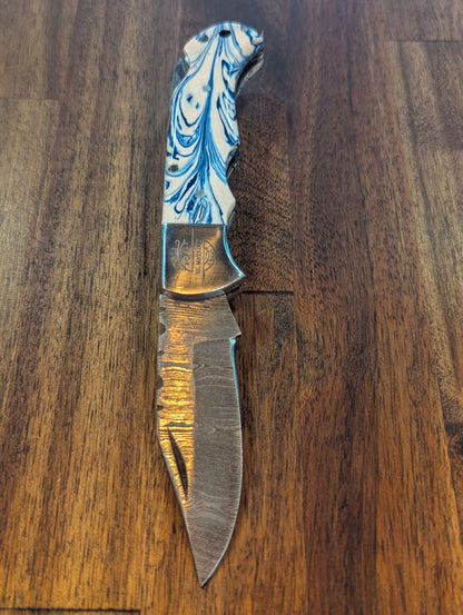 El Matador Knives Damascus Pocket Knife Blue and White Swirl Resin Damascus Pocket Knife