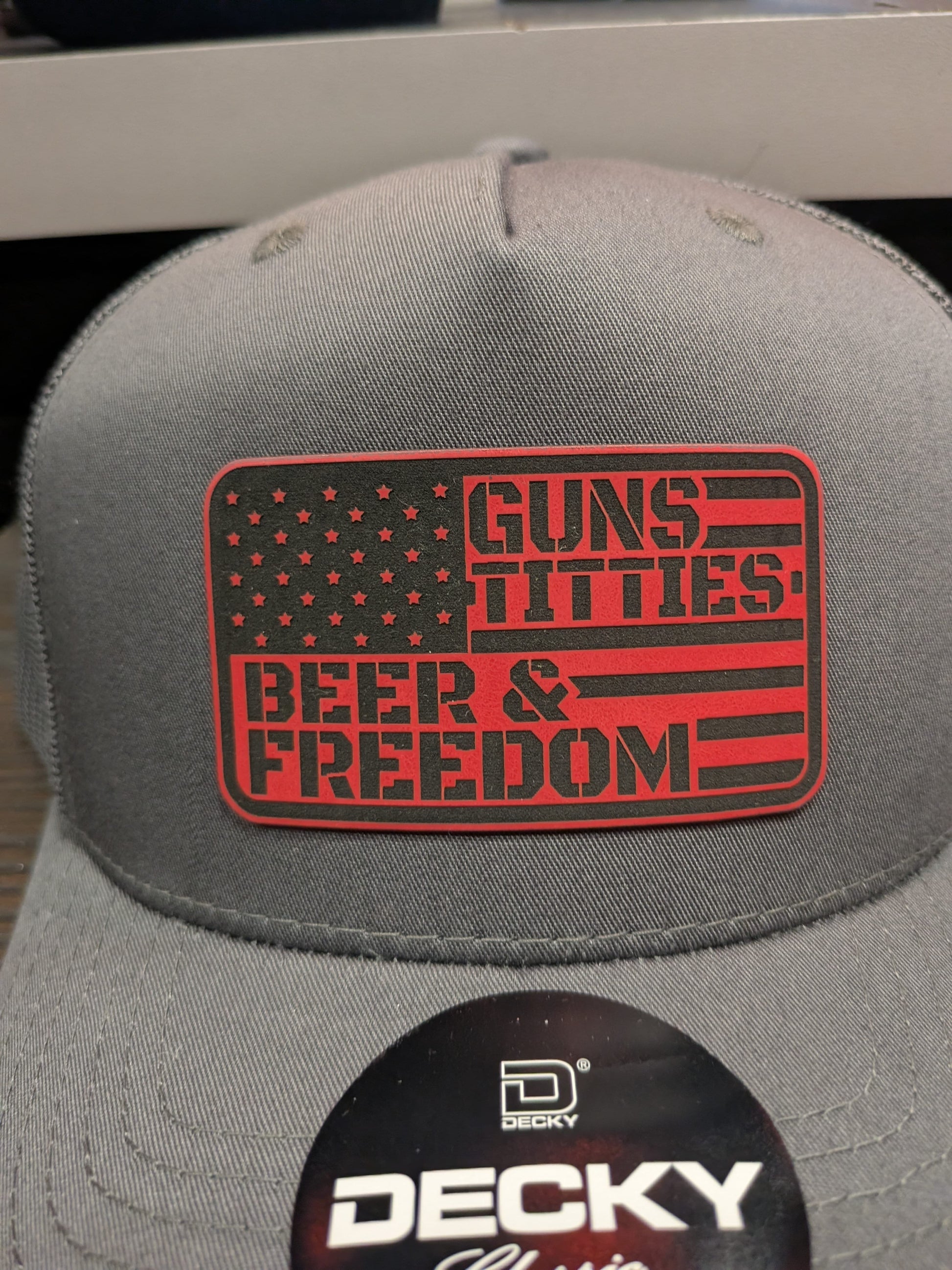 Pitcher Perfect Trucker Hat Guns. Titties. Beer. Freedom - Yupoong Snapback  Grey Hat w/Red Patch