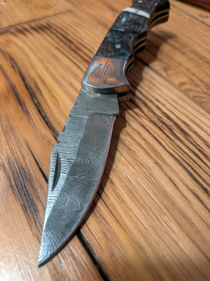 Black/white resin handle Damascus Pocket Knife