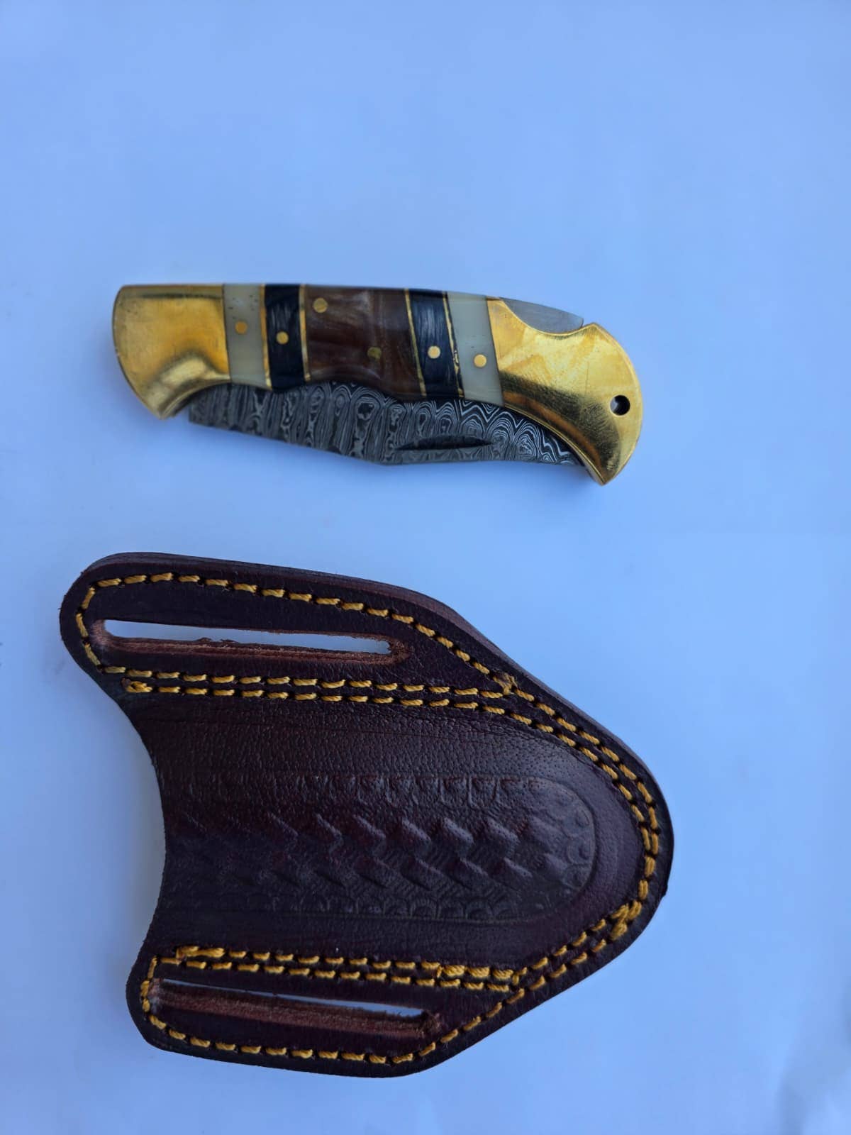 Titan International Titan International - Brass & Bone Damascus Folding Knife with Leather Sheath